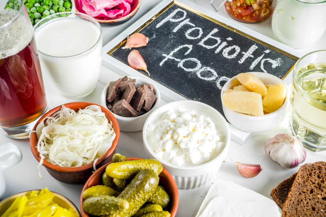 Various probiotic foods such as garlic, pickles, cheese, and cottage cheese