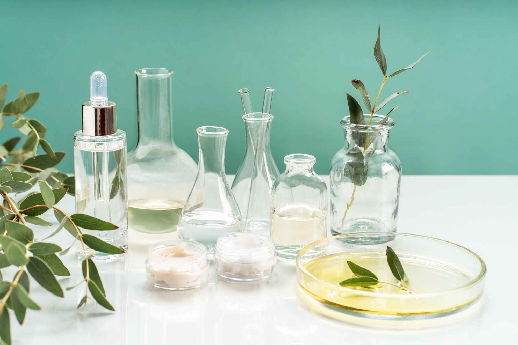Skincare products blending natural and synthetic ingredients for glowing skin